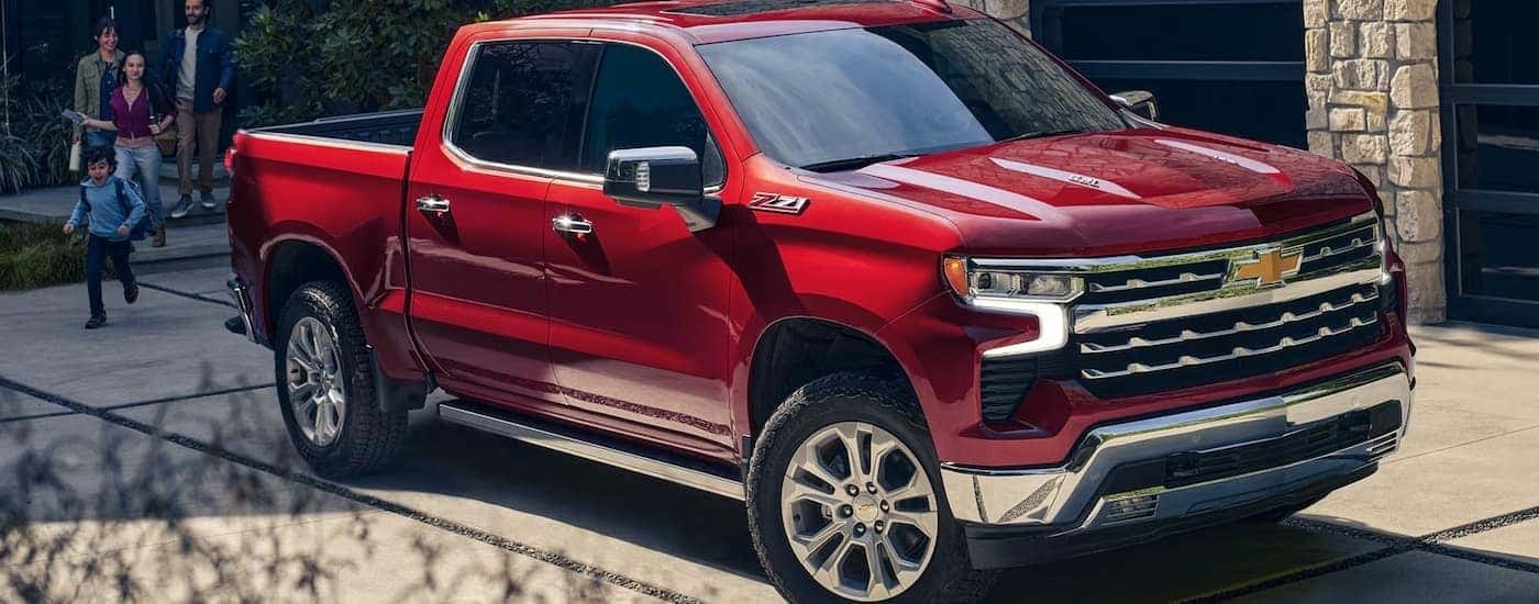 Red 2026 Chevy Silverado 1500 parked in a driveway