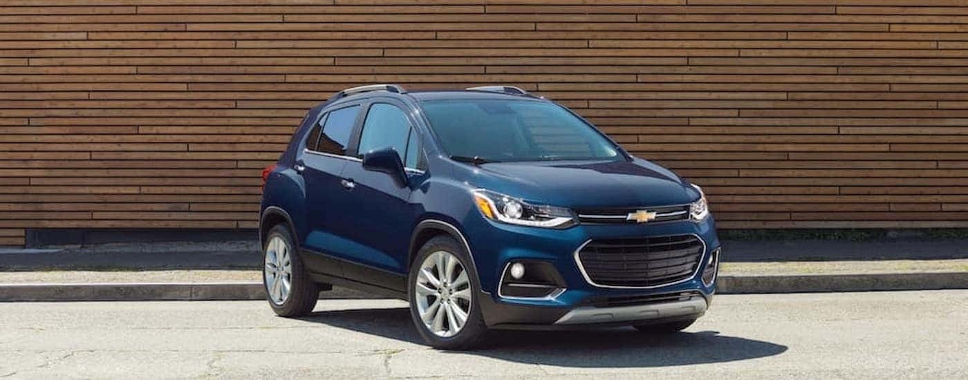 A blue 2018 Chevy Trax is shown parked at a Mountain Brook used Chevy dealer.